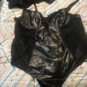 Torrid Black Bodysuit with Lace and Faux Leather